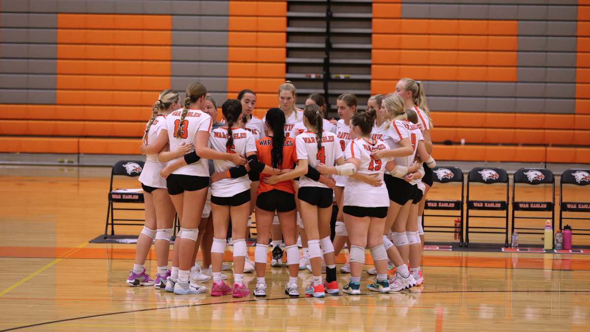 The team huddles up during a match.