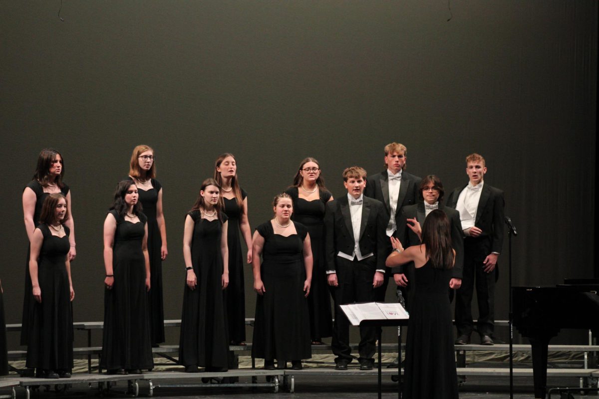 Vocal Ensemble performs "I Am in Need of Music at the fall chorus concert.