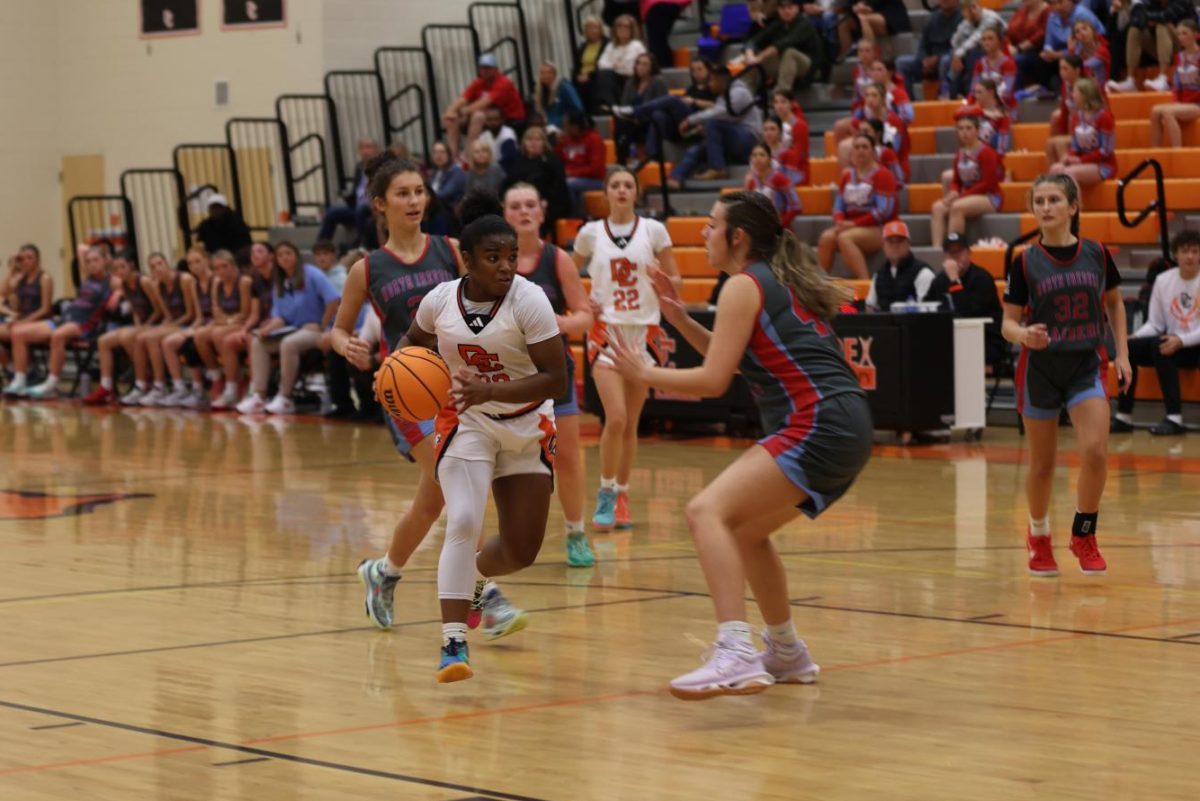 Makenzie Gentry spots the lane and runs in for the layup. 