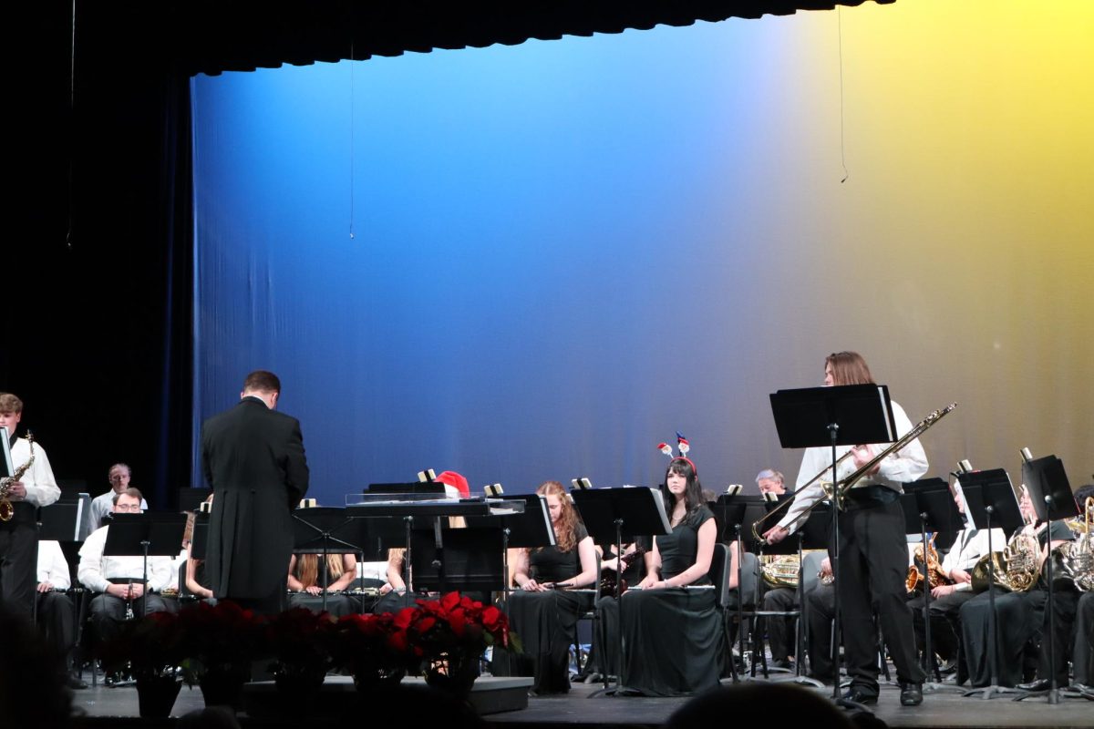 Students prepare to perform at the Winter Band Concert on December 19, 2024.