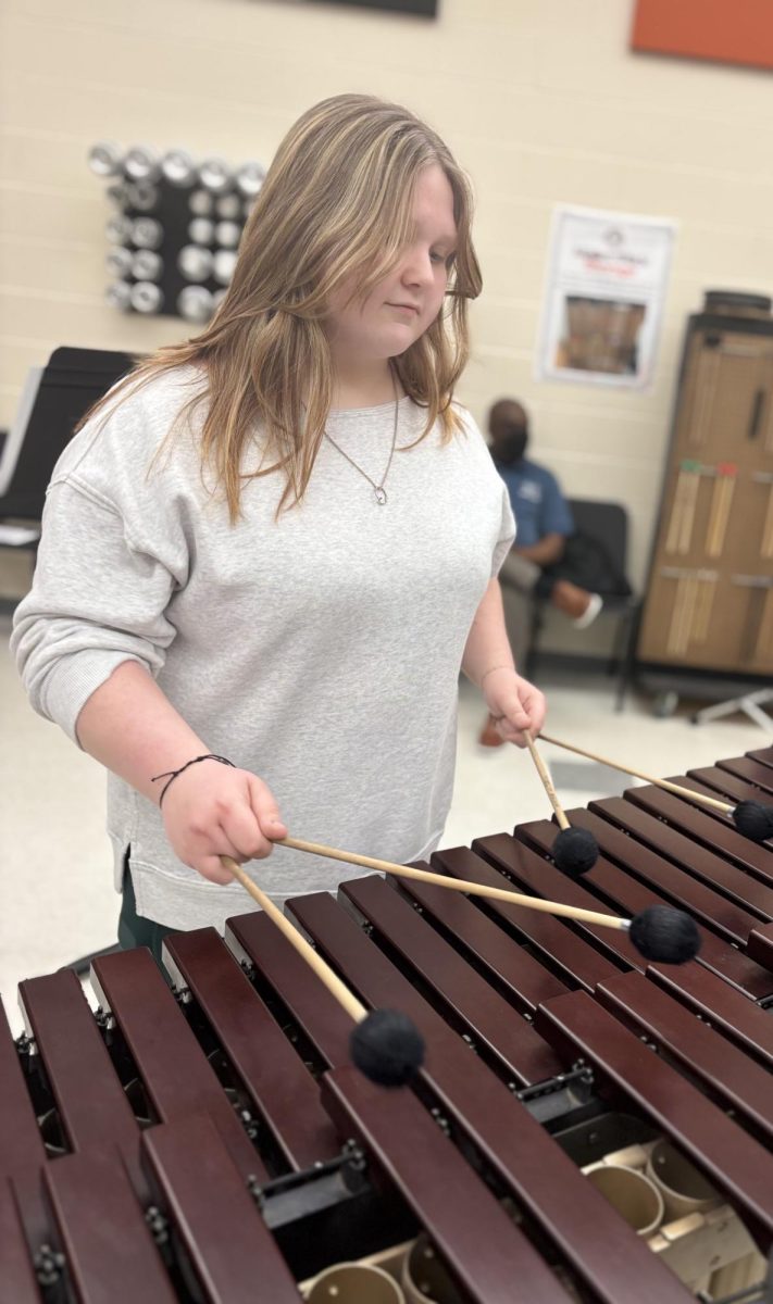 Freshman musician KatyBeth Carter plays xylophone.