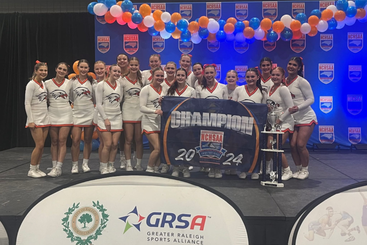 The competition cheer team poses following their victory at the NCHSAA State Championship December 7, 2024.