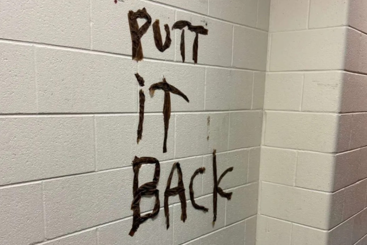 One of many images circulating through the Davie High Snapchat story shows a message placed in a spot once occupied by a mirror. The message "putt it back" was written using wet paper towels.