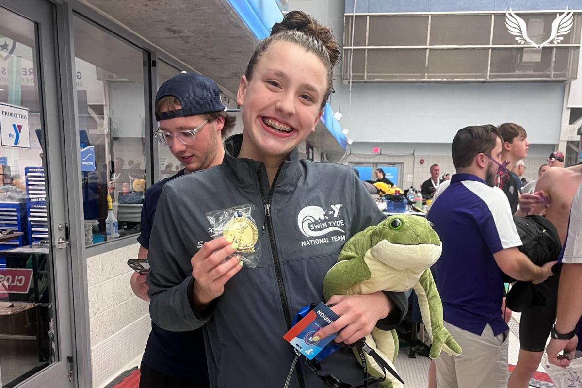 Skylar Zuleger poses with her gold medal following her victory at the 2025 YMCA Short Course Nationals. | Photo courtesy Skylar Zuleger