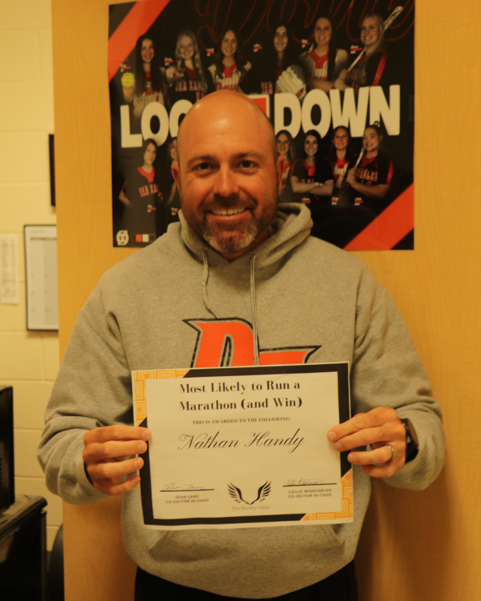 As someone who has completed several Ironman Triathlon races, it’s no wonder students voted Coach Nathan Handy as most likely to run — and win — a marathon.