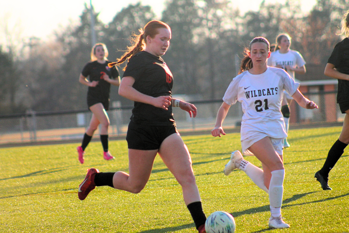 Junior Lanna Robinson charges down the field.