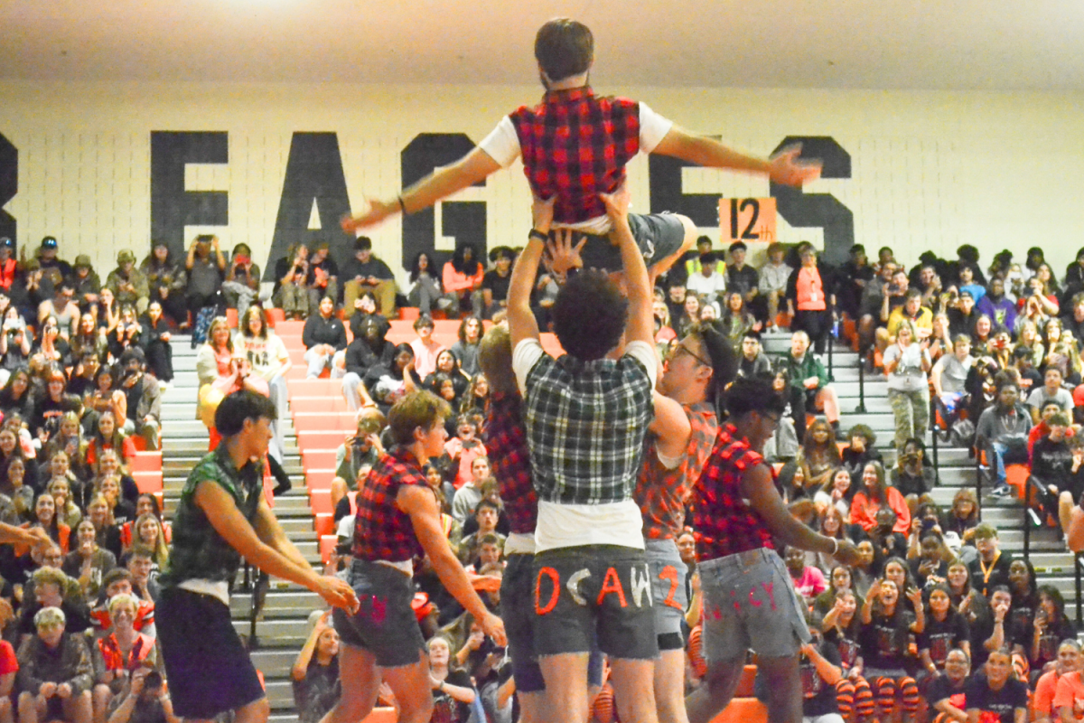 Mancing Boots take center stage, performing their routine during the Davie Day pep rally.