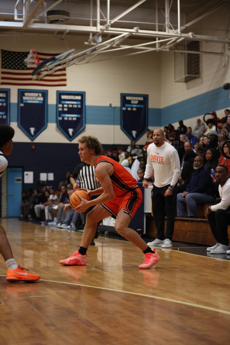 Planning his next move, senior Ethan Driver is ready to pass the ball and make the play.