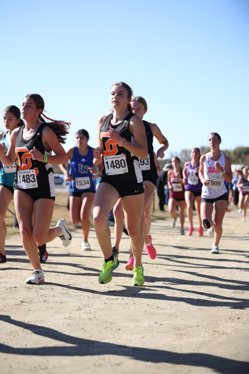 Lexi Marion keeps a constant stride as she fights towards the end of the race. 