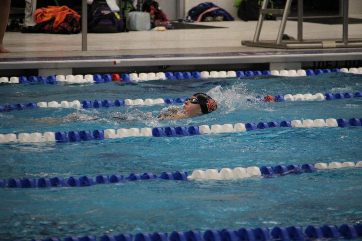 Junior Addy Buchanan swims the backstroke portion of her 200 Individual Medley. 
