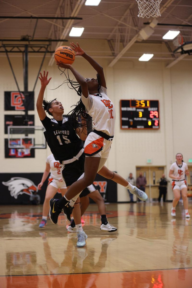 Junior Vivian Vaughters, passes the Ledford defense and jumps towards the hoop.