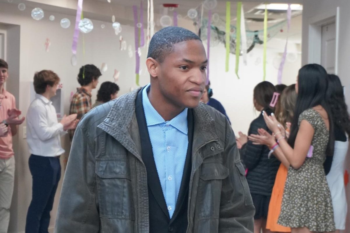 A Soaring Eagle walks in to Hope Prom 2025, taking in the decorations. 