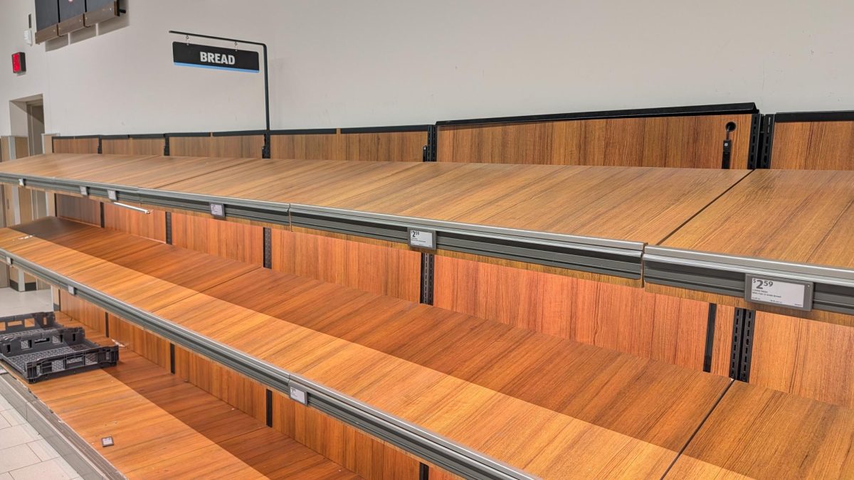 The bread aisle at the Clemmons Aldi on January 22 is empty ahead of a winter storm that threatens to cause major disruptions across the United States.
