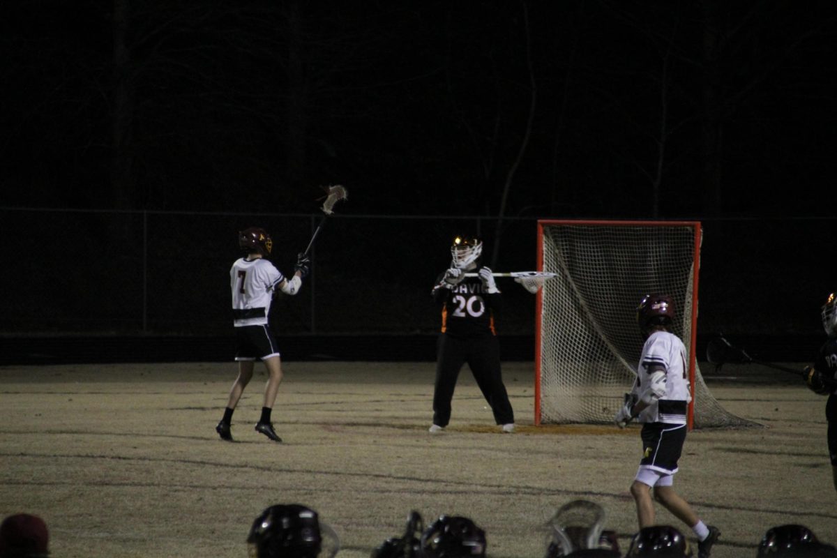 Carson Perk after making a save calls out to his teammates trying to find an open player to make the clear. 