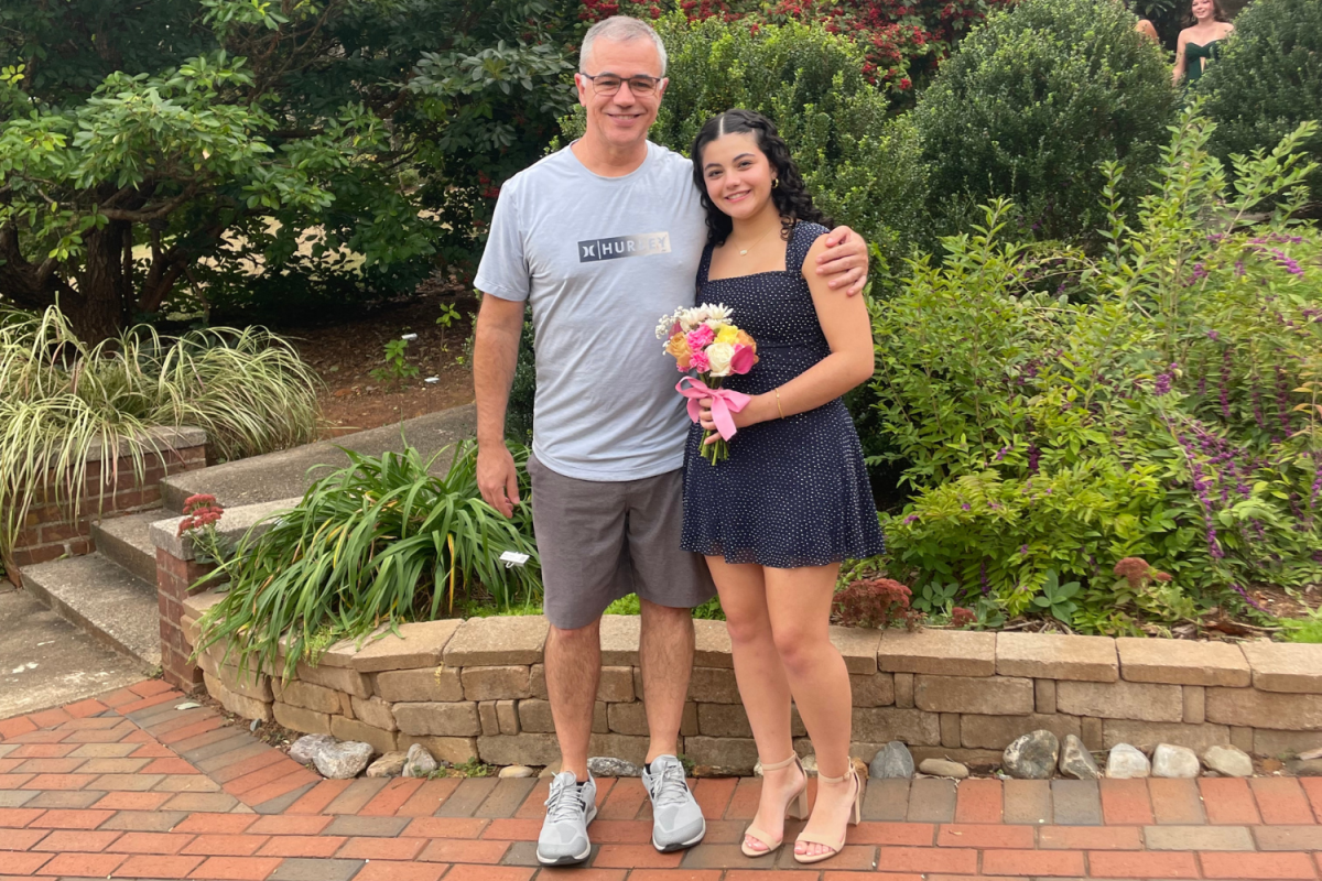 Penélope Sa and her father, Gustavo, pose for a picture together before Davie High's Homecoming Dance. Penélope cites her father as one of her biggest supporters in life. | Photo courtesy Penélope Sa
