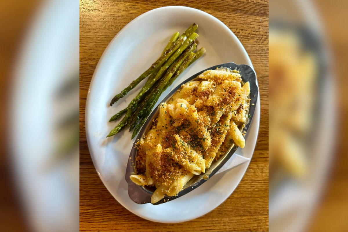 A plate of lobster macaroni and cheese sits on a table at Mocksville's Restaurant 101.