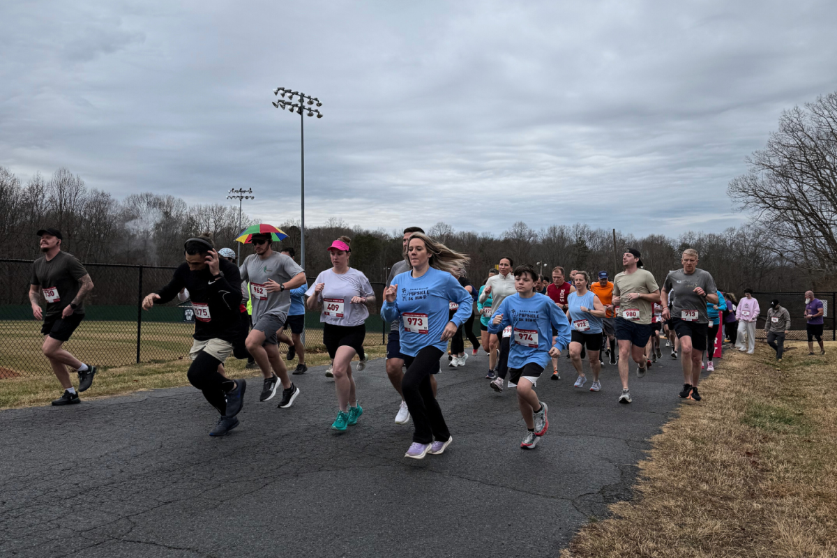 Runners charge through the starting line at the annual Popsicle 5K. | Photo courtesy Davie S.U.R.F.