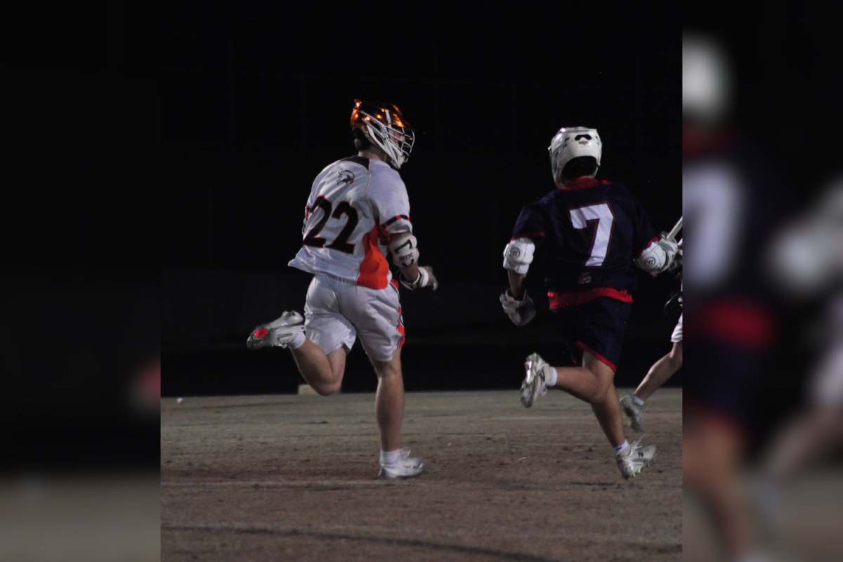 Senior Jack Pisciotta races down the field in Davie's game against Lincoln Charter.