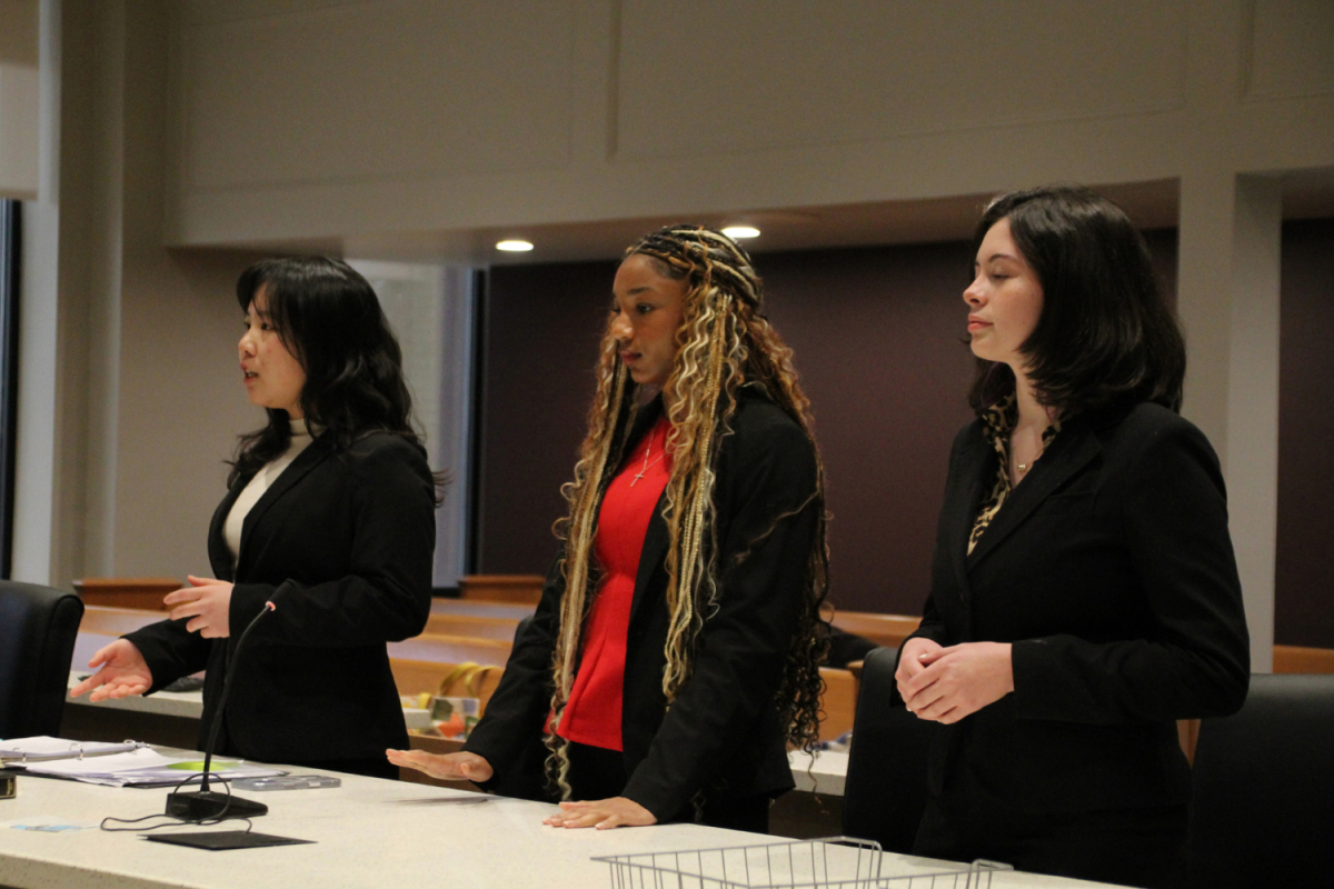 (L to R) Mock Trial members Trista Yang, Precious Jimerson, and Hailey Welborn practice for the state competition at the Davie County Courthouse.