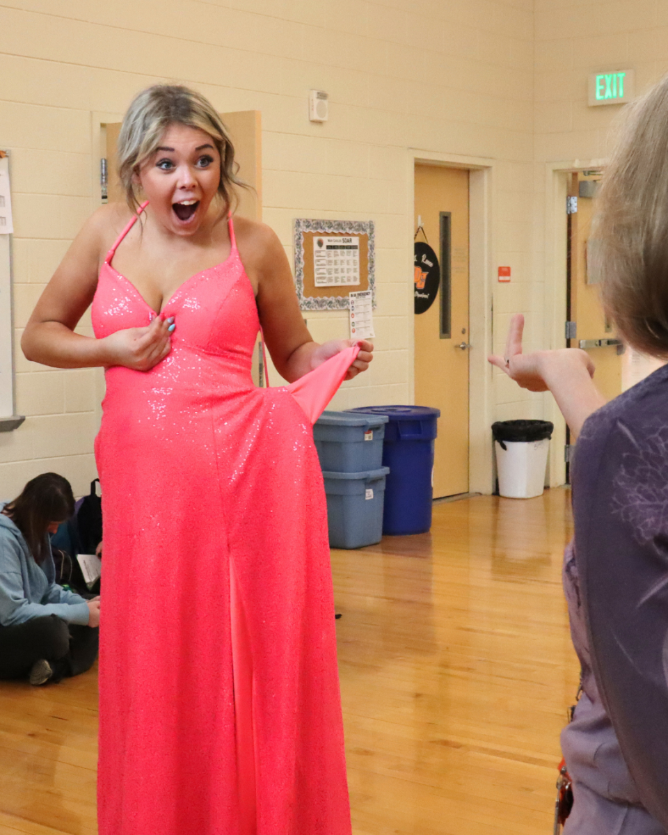 "IT HAS POCKETS!" Junior Brooklyn Brown makes a fantastic discovery while trying on dresses.