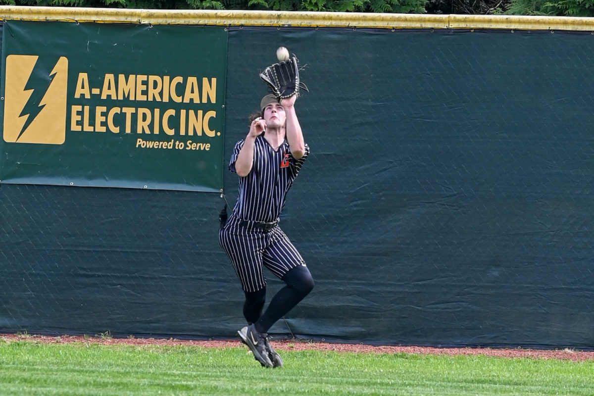 Ryan Williams catches the ball in right field to make an out for the team.