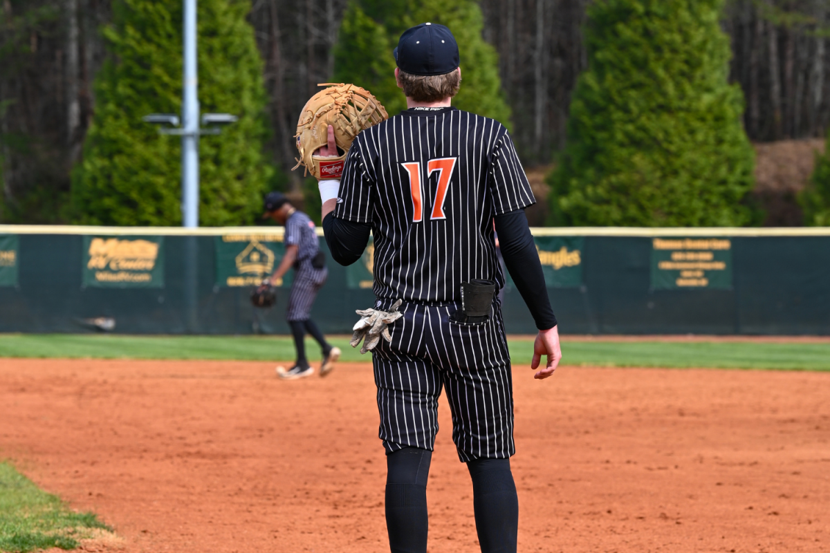 Ty Sain gets ready to catch a ball at first base.