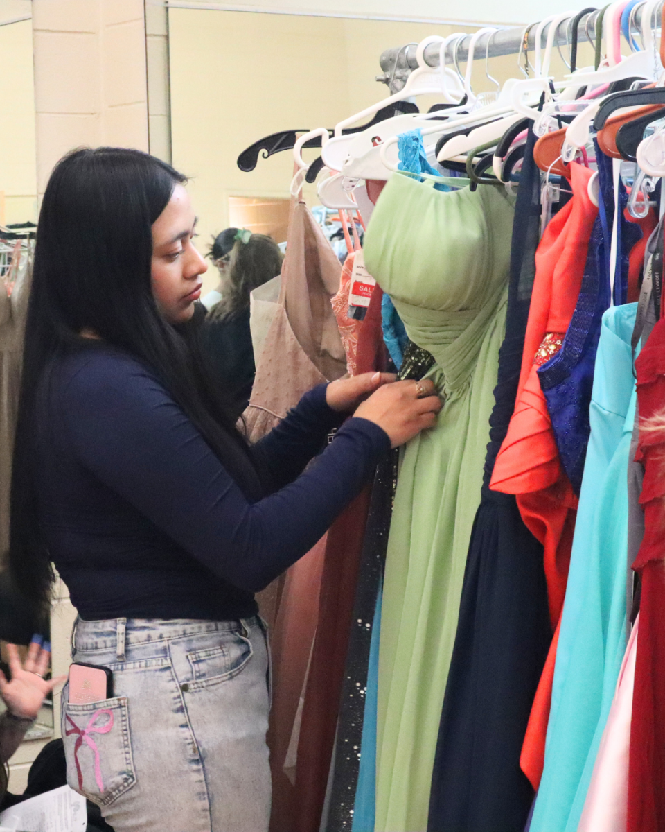 Samira Elbably-Linares looks for the best dress the rack has to offer.
