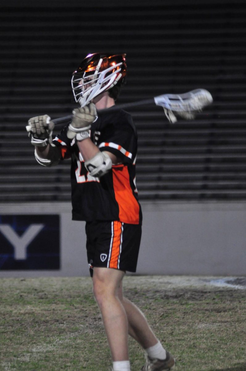 Senior Jack Pisciotta starts to make the pass to his teammate, hoping to get an assist to goal. 