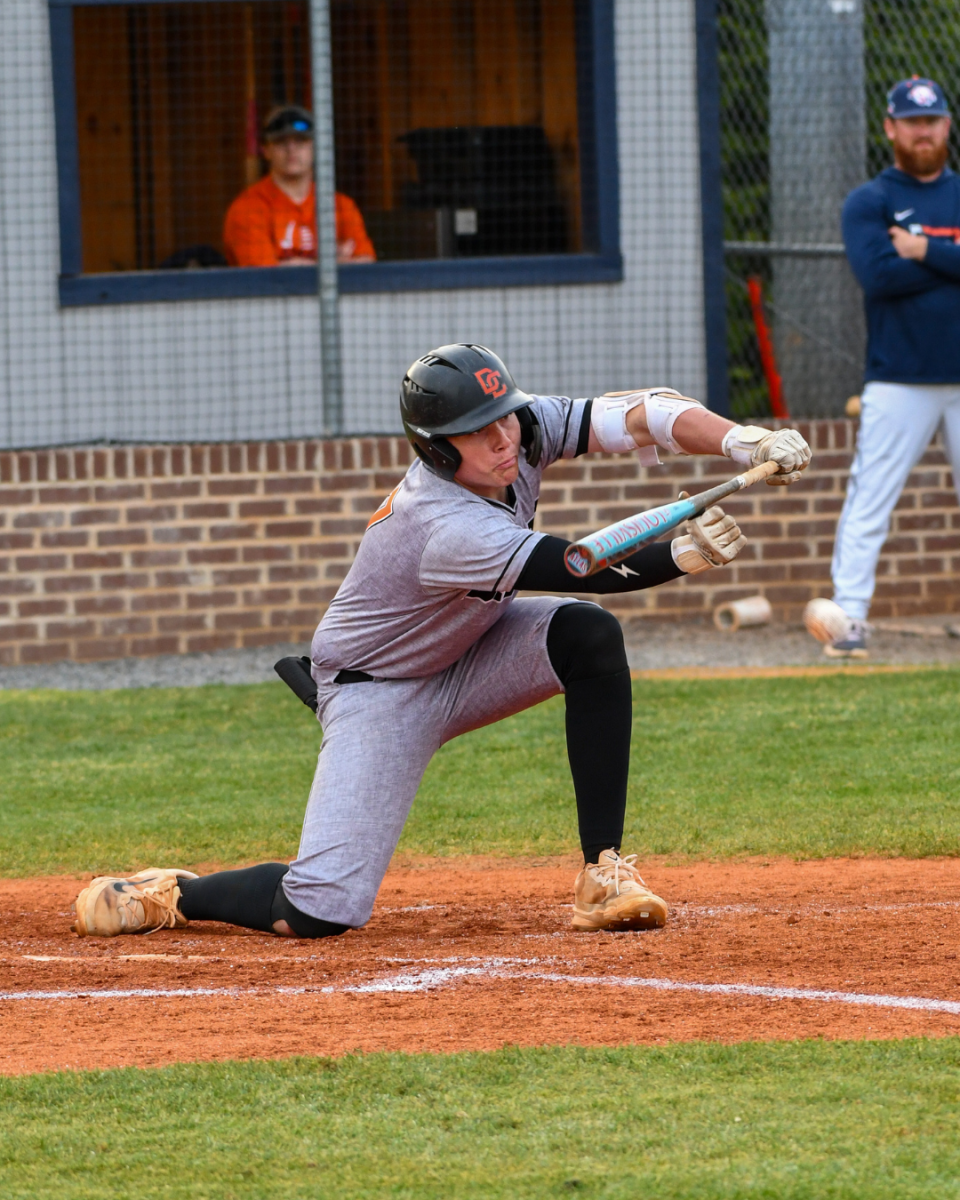 Ty Sain bunts the ball to get a run in.