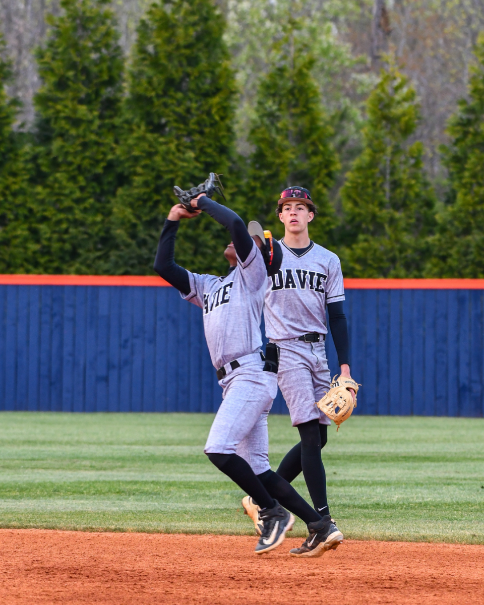 Brandon Forrest gets ready to catch the ball after the batter hit it straight up into the air. 