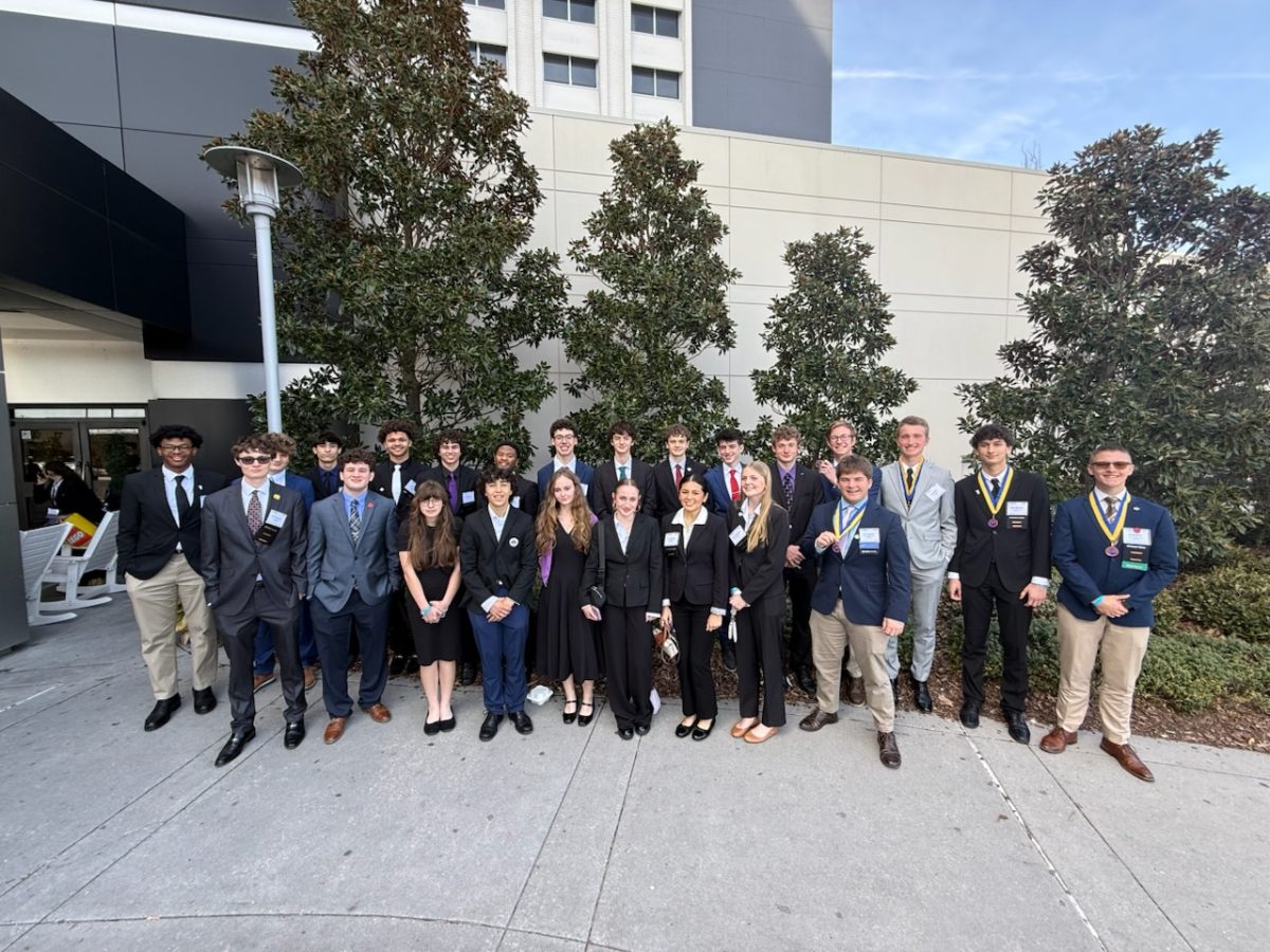 Members of the Future Business Leaders of America (FBLA) pose in front of the Koury Convention Center in Greensboro during the State Leadership Conference. | Photo courtesy Shane Young
