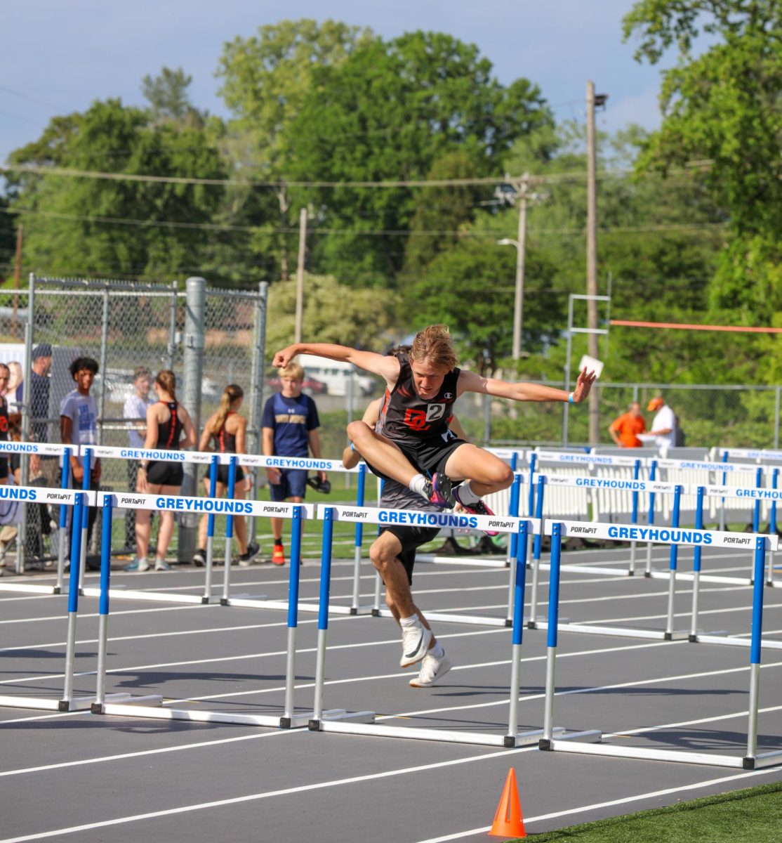 Brayden Coffey soars over the hurdles.