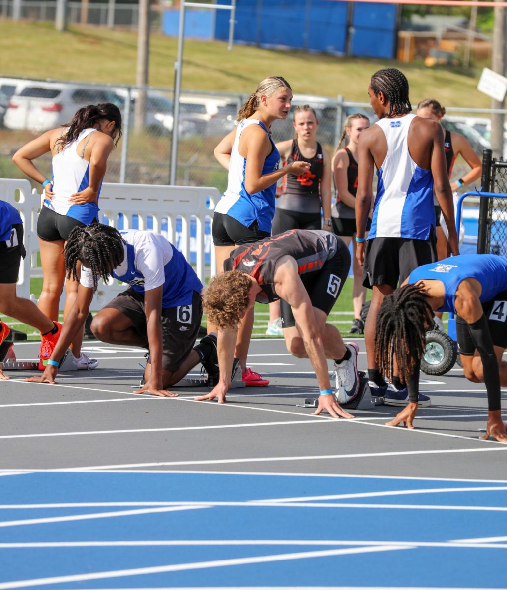 Austin Sweet prepares to make the leap over hurdles. 