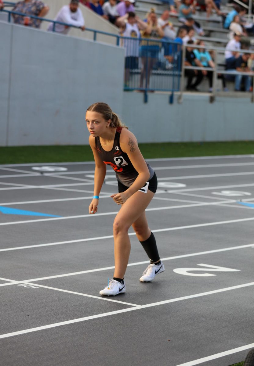 Isabella Schilling watches carefully as the gun goes off for the 400m.