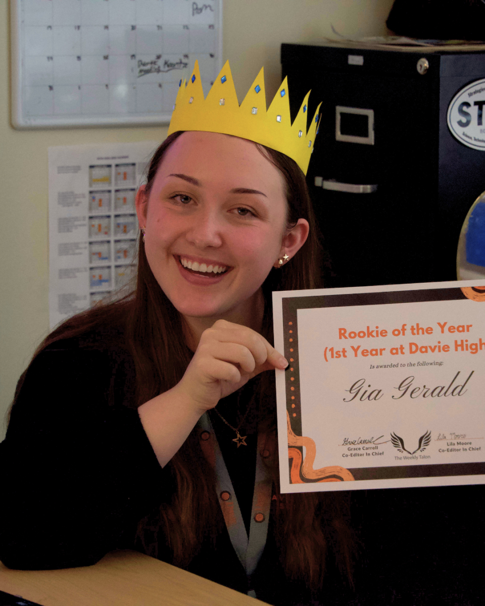Gia Gerald smiles for the camera with her Student Choice Award. This is Gerald's first year at Davie High.