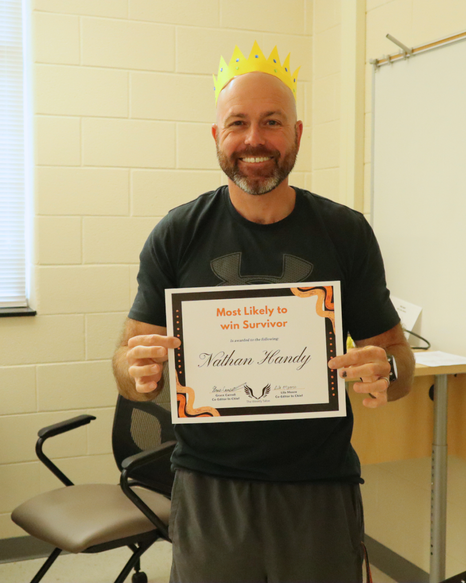 "That's the one I wanted!" Nathan Handy poses with a smile on his face with his Student Choice Award.