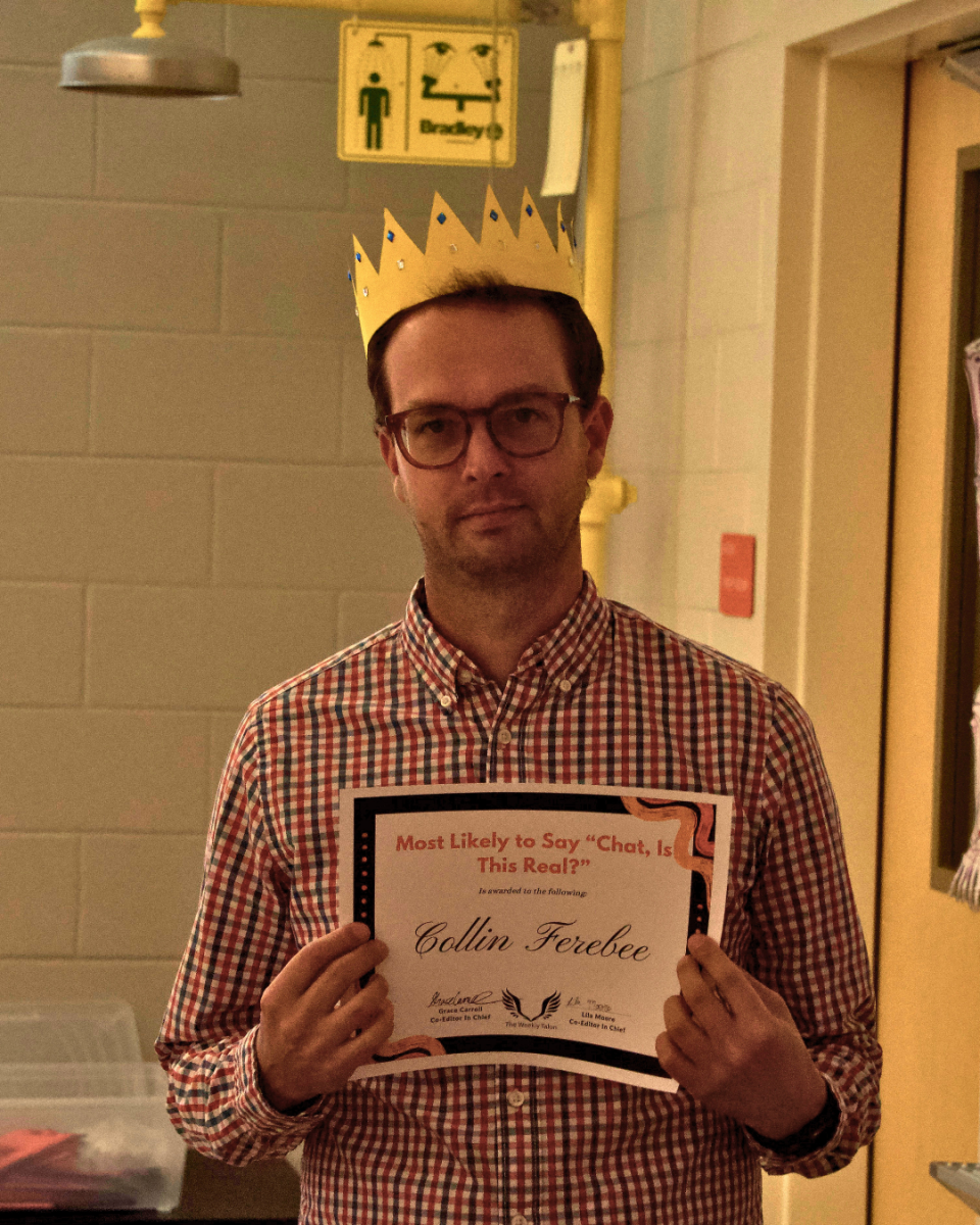 Collin Ferebee accepts his Student Choice Award (though he had been hoping for a different recognition).